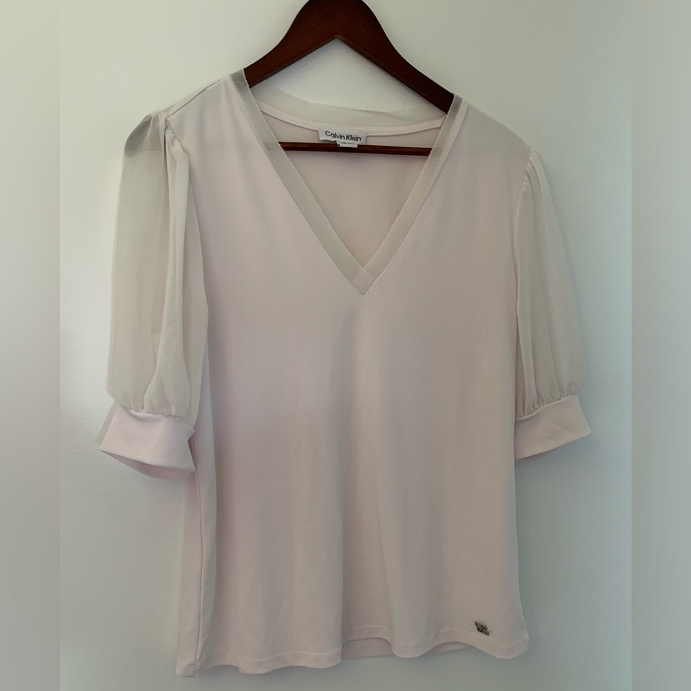Blush pink Calvin Klein blouse with sheer, puff sleeves